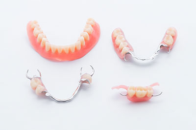 A collection of dental braces displayed on a white background.